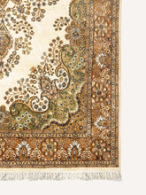 Load image into Gallery viewer, Corner shot of a traditional design hand knotted Indian carpet also known as a oriental rug.
