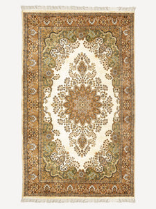 Full shot of a traditional design hand knotted Indian carpet also known as a oriental rug, in a room setting.